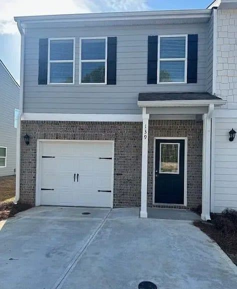 139 Village Green Drive NW — photo 1